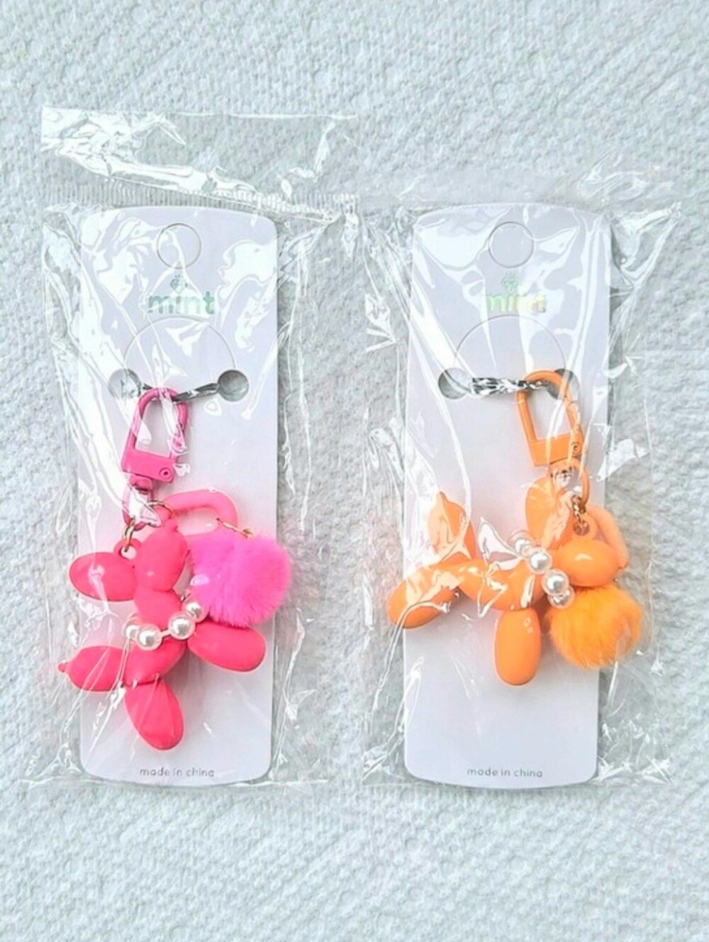 Balloon Dog Keychain/Bag Charms with Pom Pom detail by Mint - Set Of 2